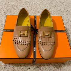 Used Once ( Sticker Still On H Hardwear ) Nude Brown Color Size 35 ( This Style Run Large , Can Fit Size 36 ) I Did Sole Sticker To Protector Shoe Bottom . Come With Box , 2 Dust Bags And Ribbon. Luxury Beige Loafers For Office, Luxury Beige Moccasins For Business, Designer Spring Loafers For Office, Designer Spring Office Loafers, Designer Tassel Loafers With Round Toe For Office, Elegant Beige Tassel Loafers For Formal Occasions, Nude Brown Color, Loafer Shoe, Hermes Shoes