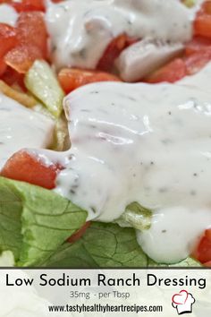 a salad with ranch dressing on it and lettuce