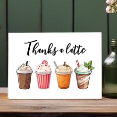 a card with three different drinks on it and the words, thanks & latte