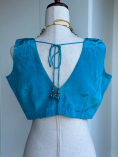 Blouse size 38-42 crape silk sleeveless blouse Sleeveless Padded Blouse In Blue, Blue Sleeveless Padded Blouse, Sleeveless Padded Blue Blouse, Summer Satin Sleeveless Blouse, Summer Sleeveless Satin Blouse, Satin Sleeveless Party Blouse, Elegant Sleeveless Satin Blouse, Elegant Sleeveless Unstitched Blouse, Elegant Sleeveless Blouse Piece For Summer