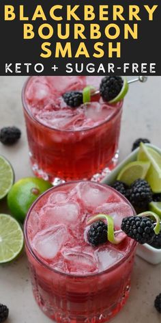 two glasses filled with blackberry bourbon smash and limes on the side, next to blackberries