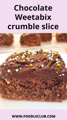 chocolate weetabix crumble slice on a plate with sprinkles