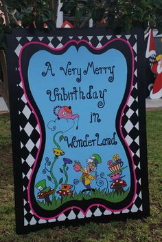 a very merry birthday sign in wonderlandland