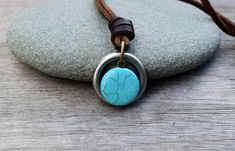 "This versatile necklace is adjustable to your desired length between 16\" and 32\". (40cm - 80cm), can be worn both short or long. The heavy-duty ring measures a little over 1 inch. The turquoise howlite stone is 0.75 inch. Ships in a gift box for easy gift giving! Shipping Details: All items will be shipped First Class by the United States Postal Service. An option to upgrade shipping to Priority or Express Service is available upon checkout for USA orders. You will be provided with a tracking Blue Adjustable Necklace For Friendship, Adjustable Blue Necklace For Friendship, Adjustable Turquoise Metal Necklace, Turquoise Jewelry With Adjustable Cord As Gift, Blue Casual Jewelry With Adjustable Chain, Casual Adjustable Jewelry With Round Pendant, Blue Adjustable Waxed Cord Jewelry, Everyday Blue Jewelry With Adjustable Length, Turquoise Waxed Cord Jewelry Gift