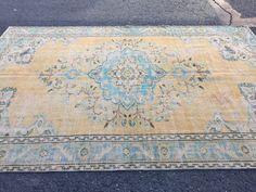 an old rug is laying on the street