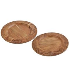 two wooden plates sitting on top of each other