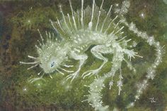 an aerial view of a sea creature in the middle of some water with bubbles coming out of it