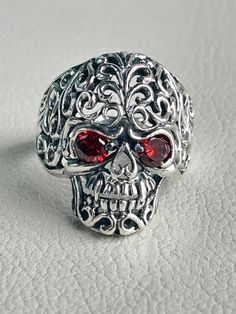 Sterling Silver 925 Skull Ring. Oxidized Biker Ring Solid Design Dimensions: Ring face:  3cm length 3cm Garnet stone 5mm x 5mm Weight:  11.1 grams Hallmarked 925 Skull Wedding Ring Red Men, Ring Man, Biker Rings, Jewelry Website, Stainless Steel Polish, Skull Jewelry, Garnet Stone, Titanium Rings, Skull Ring