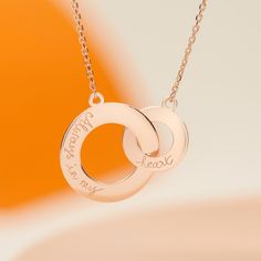 Symbolizing an ever-lasting bond, our Personalized Intertwined Necklace can be hand-engraved with your own special words for the perfect gift.The two circles move freely between each other and as a result, this is one of the few products where we engrave on one side only.18K Champagne Gold Plated, 925 Sterling Silver or 18K Rose Gold Plated18 Gold Plated chainLarge Circle (0.8 wide), small circle (0.5 wide)Hand engraved in our Paris workshopSent with love in a complimentary gift boxAny slight va Intertwined Necklace, French Cursive, Cursive Handwriting, Personalised Jewellery, Christmas Gifts For Wife, Small Circle, Metal Engraving, Jewellery Gift, Circle Necklace