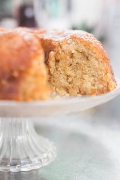 a close up of a cake on a plate with a bite taken out of it