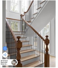 an image of a staircase with wooden handrails and white walls in the background