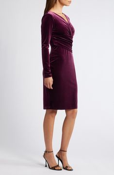 Sultry elegance defines this curve-accentuating dress crafted from rich velvet and topped with a ruched wrap-front bodice. 40" length (size 8) Surplice V-neck Long sleeves Lined 90% polyester, 10% spandex Dry clean Imported Eliza Dress, Dress Crafts, Eliza J, Nordstrom Dresses, Plum, Size 16, Bodice, Bodycon Dress, Size 12