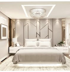 a large white bed sitting under a chandelier in a bedroom