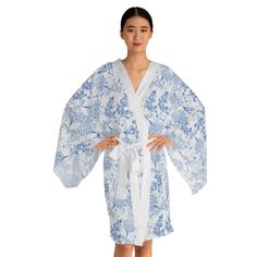 Whether it's lounging at home or making a stylish appearance, these kimono-style robes are as beautiful as they are cozy. With a figure-flattering shape, this chic mid-length robe features the signature flowing bell sleeves and a belt, making it an absolute delight for Japanese style enthusiasts. Each kimono is 100% made with Polyester for that smooth & silky feel. .: 100% polyester .: Light fabric (4.72 oz/yd²(160g/m .: Figure-flattering and versatile shape .: Smooth feel . Grand Millennial Blue | Blue and White Floral | Classic | Southern Decor | Floral Blue | Classic Southern | GM Designs  traditionally classic Grandmillennial | Granny Chic |Ornate  | Landscape Art Blue Spring Robe For Loungewear, Relaxed Fit Kimono For Sleep, Blue Cotton Robe For Spring, Blue Kimono With Kimono Sleeves For Daywear, Blue Summer Robe For Daywear, Blue Robe For Summer Daywear, Spring Kimono With Relaxed Fit, Robe With Relaxed Fit And Kimono Sleeves For Daywear, White Relaxed Fit Kimono For Loungewear