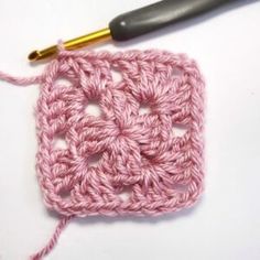 the crochet square is being worked on