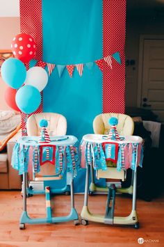 two children's chairs and table set up for a birthday party