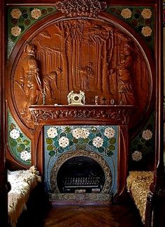 an ornate fireplace in the corner of a room