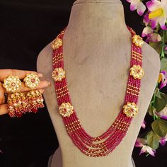 Exotic and snag-free kundan beaded necklace set with earrings. This is a stylish set with White Kundan. This set will work well with traditional, formal, and western formals. Eye-catching and unique jewelry that will set you apart. Gift this piece to a loved one, and see their face light up with joy. Best for gifting or for personal use, wear it to any occasion and become the spotlight. Festive Jewelry Sets With Dangling Beads For Celebration, Festive Polished Round Bead Jewelry Sets, Festive Celebration Jewelry Sets With Polished Beads, Festive Chandbali Kundan Necklace With Dangling Beads, Festive Formal Kundan Necklace With Round Beads, Diwali Temple Jewelry Kundan Necklace With Dangling Beads, Festive Bridal Necklace With Dangling Beads, Festive Kundan Jewelry Sets With Round Beads, Kundan Necklace With Dangling Beads For Festivals