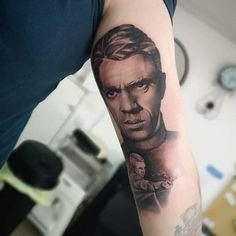 a man's arm with a portrait of the famous actor in black and white