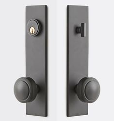 two black door handles with a keyhole on each one