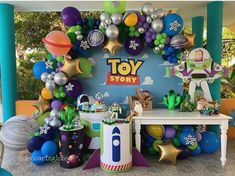 a toy story birthday party with balloons and decorations