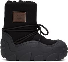 Ankle-high canvas boots in black. · Rubber cap toe · Lace-up closure · Elasticized padded collar · Logo patch at outer side · Sculptural rubber midsole · Treaded rubber outsole Supplier color: Black Acne Boots, Black Snow Boots, Canvas Boots, Brand Concept, Puma Fierce Sneaker, Snow Boots, Black Ankle Boots, Luxury Streetwear, All Black Sneakers