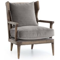 the arm chair is made out of wood and has a gray cushion on top of it