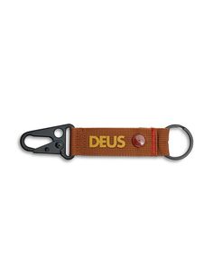 a keychain with the word deus printed on it