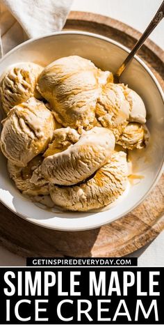 a bowl filled with ice cream on top of a wooden table