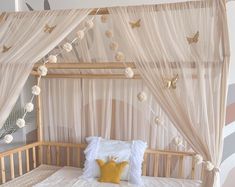 a bed with white sheets and flowers on the headboard is decorated in beige tones