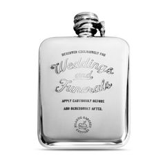 a silver flask with the words wedding and ceremony engraved on it's side