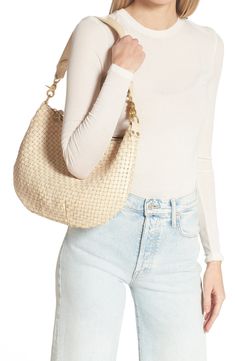 Ideal for everyday wear, this woven-leather carryall that holds the out-and-about must-haves can be worn as a crossbody or shoulder bag. Removable crossbody and shoulder straps Cotton lining Leather Imported Latinx Owned and Founded Versatile Woven Leather Hobo Bag For On-the-go, Versatile Hobo Bag With Braided Handles For On-the-go, Woven Leather Satchel For On-the-go, Luxury Woven Bags For On-the-go, Woven Leather Crossbody Bucket Bag For On-the-go, On-the-go Natural Hobo Shoulder Bag, Luxury Woven Leather Shoulder Bag For On-the-go, Everyday Leather Bags With Intrecciato Weave, Luxury Woven Leather Shoulder Bag For Travel