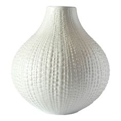 a white vase is shown on a white background with no one around it to see the details