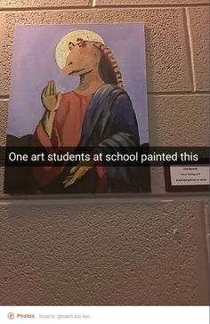 an image of jesus holding his hands up in front of a sign that reads, one art students at school painted this