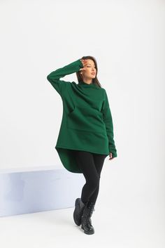 "Extravagant and asymmetrical this loose warm hoodie is a \"must-have\" for the season. Features front pocket, thump holes &  comfy hood. The model in the picture is 176cm. ⅼ 5.8 ft. tall and is wearing size S / color: Green 🌟 INFO: * Worldwide EXPRESS shipping - please provide a phone number for shipping documents * US Sizing XS to 4XL -  size chart available below - all measurements of the body * We offer customization to Personal Measurements & Larger Sizes 5XL, 6XL, and 7XL .... 🌟 MATERIAL & CARE * fabric: Cotton Mix * hand wash * cold water 30 degrees * iron at medium temperature 🌟 🌟 🌟 SIZE CHART 🌟 🌟 🌟 SIZE XS Bust: around 33.5\" / 85cm Waist: around 26\" / 66cm Hips: around 36\" / 91 cm SIZE S Bust: around 35.5\" / 90 cm Waist: around 28\"/ 71 cm Hips: around 38\"/ 97 cm SIZE Plus Size Techwear, Asymmetrical Hoodie, Dark Green Hoodie, Jedi Outfit, Plus Size Sweatshirt, Goth Clothing, Asymmetrical Cut, Womens Hoodies, Long Knit Cardigan