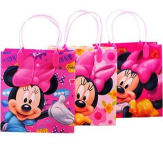 three bags with minnie mouse designs on them