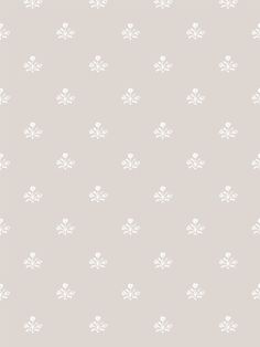 a gray and white wallpaper pattern with small leaves on the left side of it