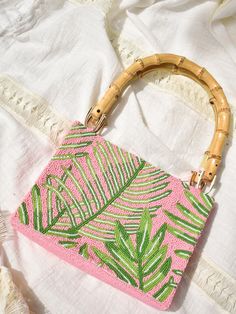 Beaded Palm Leaf Bag with Bamboo Handles  | Confête Palm Leaf Bag, Leaf Bag, Palm Leaf Pattern, Hand Palm, Occasion Outfit, Palm Leaves Pattern, Bamboo Bag, Seed Beading, Palm Leaves Print