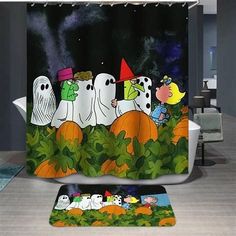 halloween themed shower curtain and rugs with cartoon characters on them in front of a bathtub