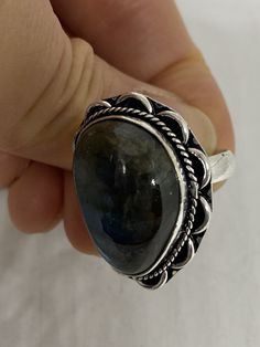 Huge blue green Labradorite rainbow moonstone Lovely vintage silver setting is low content silver Size 8.75 My jeweler can re size it up or down for a $15 fee Ring is long covers from knuckle to knuckle. All rings are shipped in a nice gift box. Check out our over a THOUSAND great reviews Engraving is $4 per letter and is not always perfect depending on the piece. It can take a few days if the jeweler is busy. This is payable to Paypal Judithsltd@gmail.com Bohemian Blue Labradorite Rings, Unique Labradorite Ring With Large Stone, Silver Bohemian Labradorite Ring, Nickel-free Blue Labradorite Jewelry, Green Labradorite, Bohemian Nickel-free Labradorite Jewelry, Large Round Labradorite Gemstones, Vintage Rainbow, Purple Art