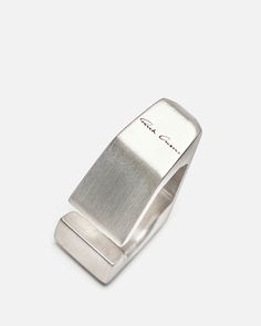 Rick Owens SS24 Lido Prong Ear Cuff in Silver. This ear cuff features an engraved logo on the back edge, prong bench inspired and a matte finish. Craig Green, Eckhaus Latta, Caged Sandals, Silver Ear Cuff, Black Aviators, Black Tank Dress, Neon Purple, Men Earrings, Engraved Logo