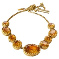 This necklace is absolutely gorgeous! The paste have a sunny orange glow to them and th necklace is gold filled. The settings are so ornate and have delicate detail. Length: 42cm Stone Dimensions: 12x17 - 8mm Weight: 22.7g Paste Jewelry, Lily Necklace, Festoon Necklace, Orange Glow, Garnet And Gold, Gold Filled Necklace, Garnet Necklace, Fringe Necklace, Ruby Necklace