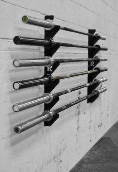 there are many different types of tools hanging on the wall