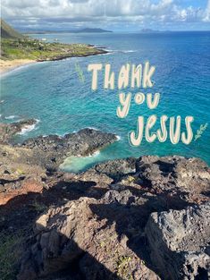 the words thank you jesus written on rocks by the ocean