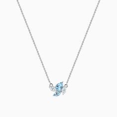 Alluring with its ethical beauty, this Ecksand aquamarine and diamond necklace is a timeless classic with a modern twist. The tranquil shades of blues and whites are mesmerizing when contrasted with the high-end recycled gold chain. Accent stones: Aquamarines, diamond, VS2+/F+, total 0.75 ctwChain width: 1 mm approx.Chain length: 16 / 18 in.Chain type: Diamond-cut trace chainClosure: Lobster clasp Modern Blue Diamond Necklace, Fine Jewelry Aquamarine Light Blue Necklace, Light Blue Aquamarine Necklace Fine Jewelry, Fine Jewelry Light Blue Aquamarine Necklace, Aquamarine Light Blue Necklace For Anniversary, Light Blue Diamond Necklace For Anniversary, Light Blue Fine Jewelry Necklace For Anniversary, Types Of Diamonds, Aqua Marine