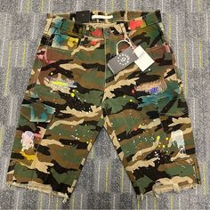 Kloud 9 Camo Shorts Men’s Size 32 Distressed Paint Splatter Streetwear Hip Hop Nwt -Excellent Condition Nwt -Skater Or Streetwear Fashion -Distressed And Splatter Paint Design -Inseam 12in -Length 22in -Waist 16in -Leg Opening 8in Casual Paint Splatter Streetwear Bottoms, Casual Ripped Camouflage Bottoms, Casual Paint Splatter Bottoms For Summer, Multicolor Streetwear Shorts With Pockets, Splatter Paint, Streetwear Hip Hop, Paint Design, Street Fashion Men Streetwear, Men Streetwear