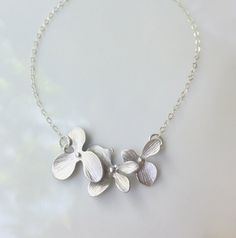 Gold or Silver Orchid Necklace  Flower Necklace by GlassPalaceArts, $34.00 Delicate Silver Jewelry With Flower Decoration, Silver Flower Necklace For Wedding, Elegant Silver Flower Necklace With Decoration, Elegant Silver Flower Decoration Necklace, Wedding Flower Necklace With Flower Charm, Silver Delicate Flower Charm Necklace, Delicate Silver Flower Charm Necklace, Silver Flower Necklace With Delicate Chain For Wedding, Flower Charm Necklace For Bridesmaid Gift