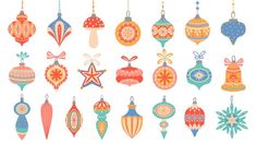 christmas ornaments hanging from strings on white background