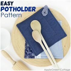 an easy potholder pattern with wooden spoons and blue napkins on a plate