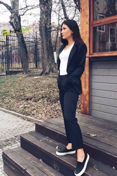 Women's suits are not just for formal wear.  Pair them with your sneakers to create an outstanding casual outfit. #workattire Update your closet with this black stylish pants suit set. Pants suits for women business work outfits| Pinstripe pants suit for women's work attire. #womensfashion  work attire professional outfit ideas|  outfit ideas for work professional attire| Office Attire Women With Sneakers, Corporate Attire Women With Sneakers, What To Wear With Black Pinstripe Pants, Patient Registration Outfit, Spring 2023 Work Wear, Work Wear With Sneakers, Business Casual Outfits Shoes, Work Attire With Sneakers, Casual Outfits For Work With Sneakers